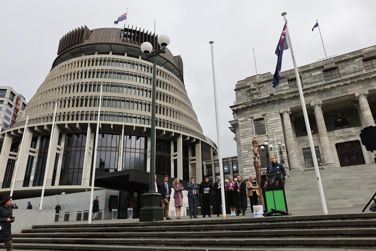 SPCA Chief Scientific Officer Dr. Arnja Dale speaks to the crowd on the steps of Parliament.