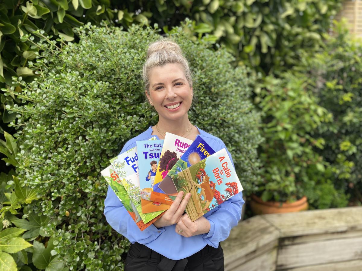 SPCA Education Manager Nicole on our new story books